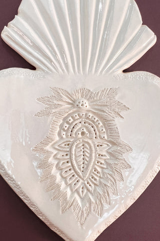 Ex-voto grigri à plumes