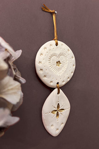 Talisman coeur aux étoiles d'or