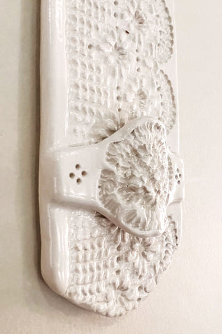 Porte-fleurs à dentelle