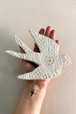 Hirondelle au coeur d'or