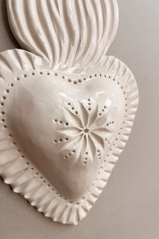 Ex-voto bombé à fleur étoilée
